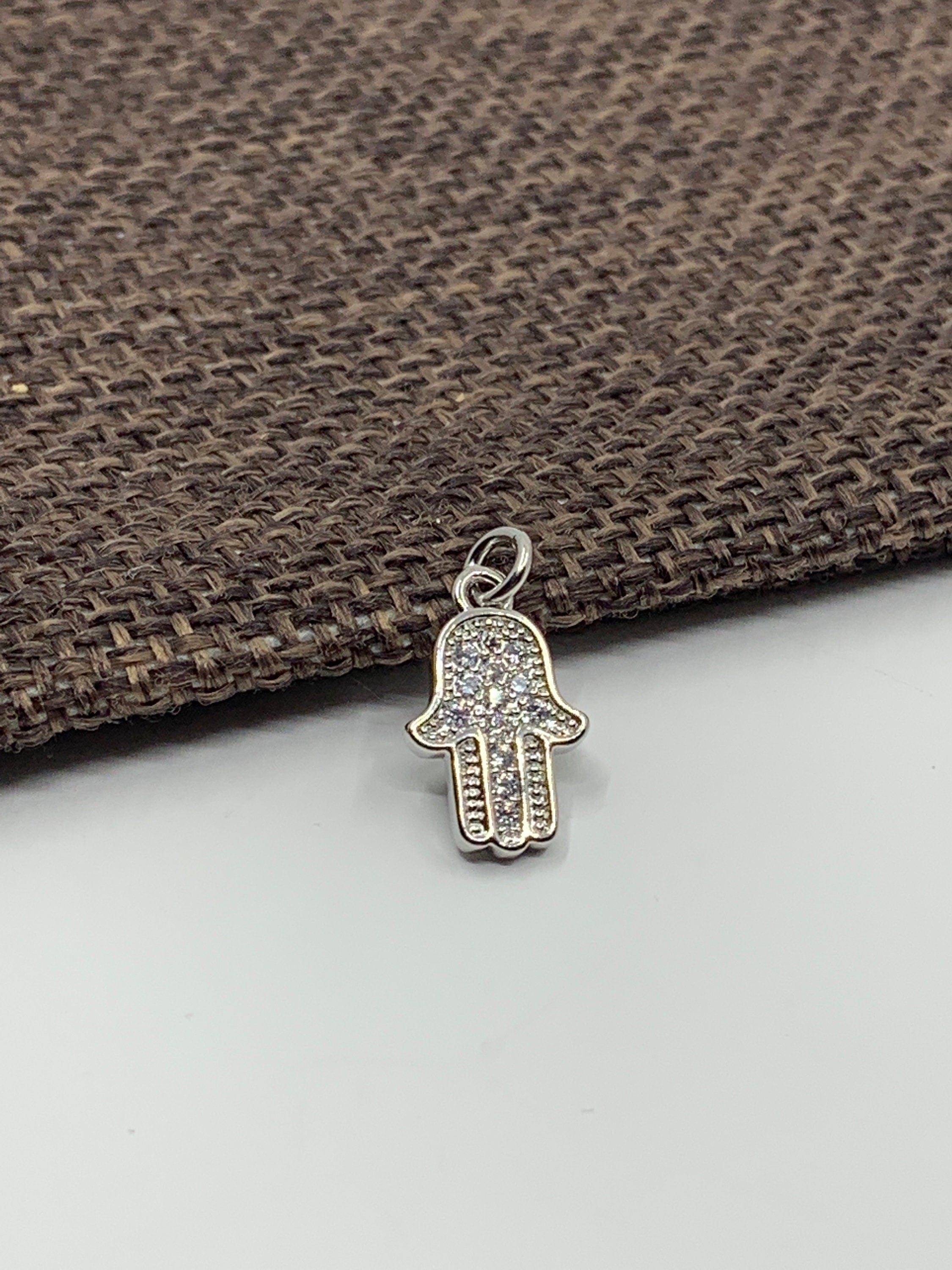 Silver hamsa hand pendant cz pave