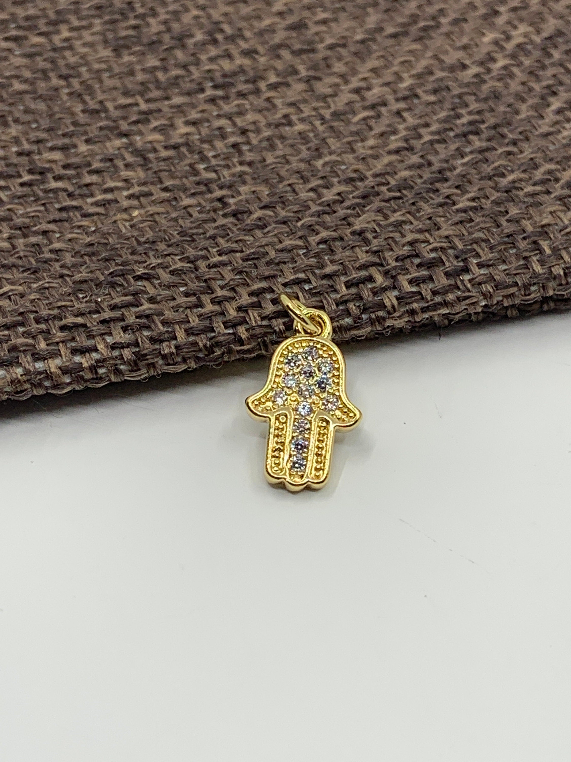 Gold hamsa hand pendant cz pave