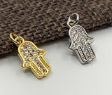 Gold, silver hamsa hand pendant