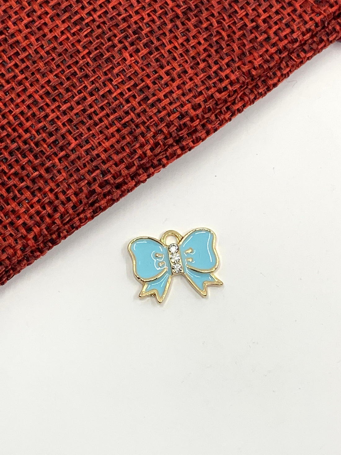 Enamel bow pendant | Bellaire Wholesale