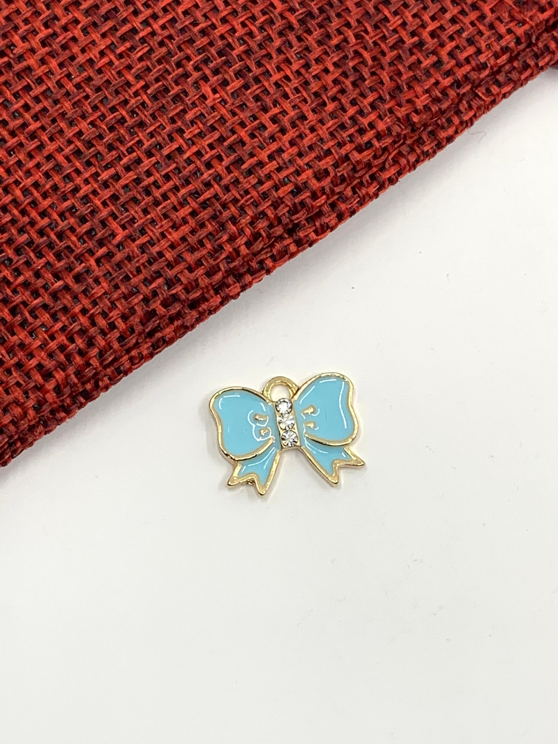 Enamel bow pendant | Bellaire Wholesale