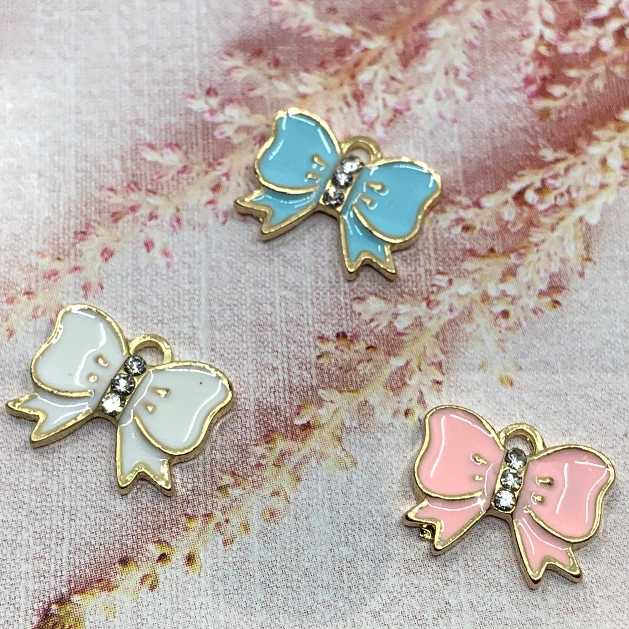 Enamel bow pendant | Bellaire Wholesale