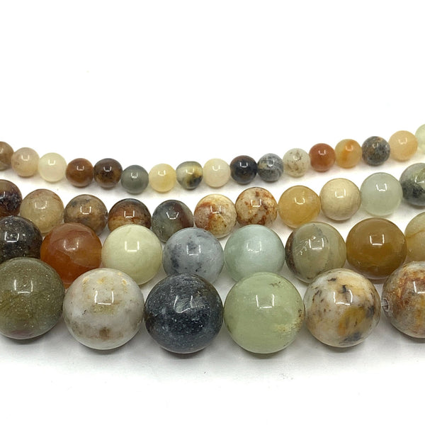 4mm, 6mm, 8mm and 10mm size of flower jade beads shown in comparison