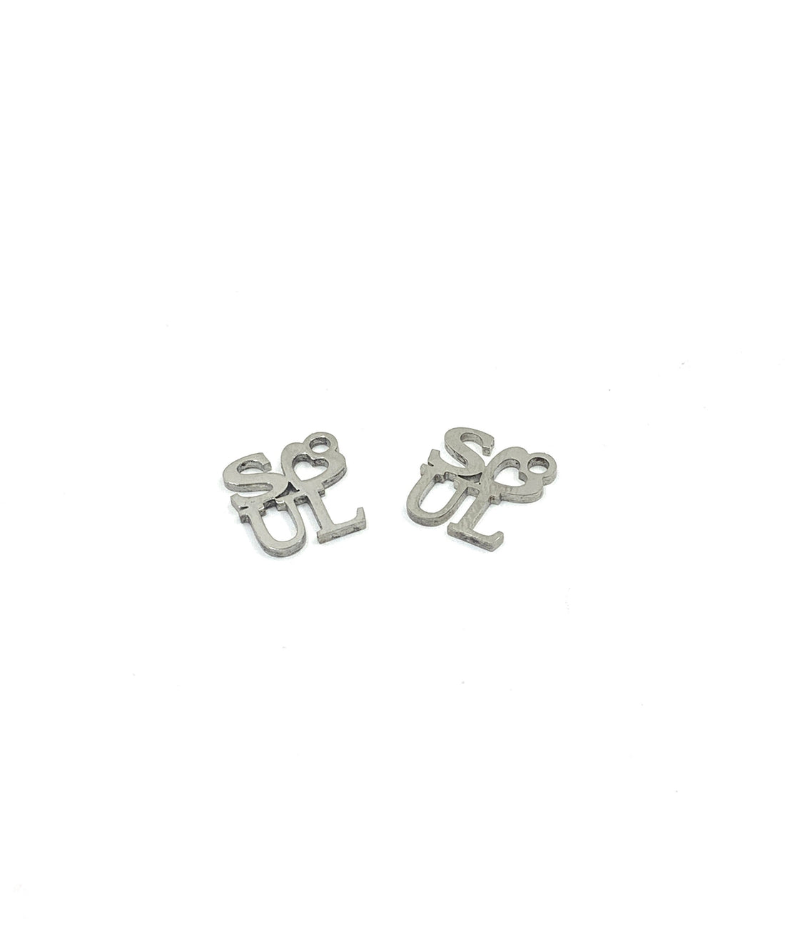 Soul writing charms against a white background 