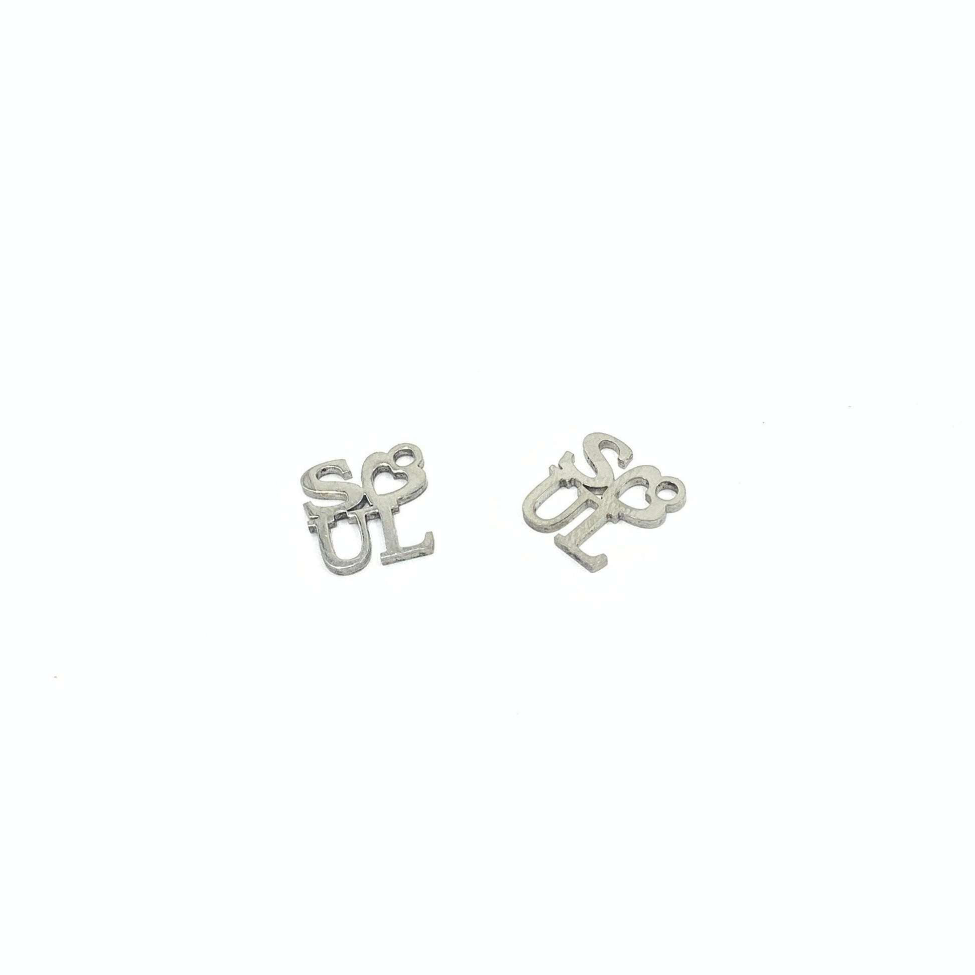 Soul writing charms against a white background 