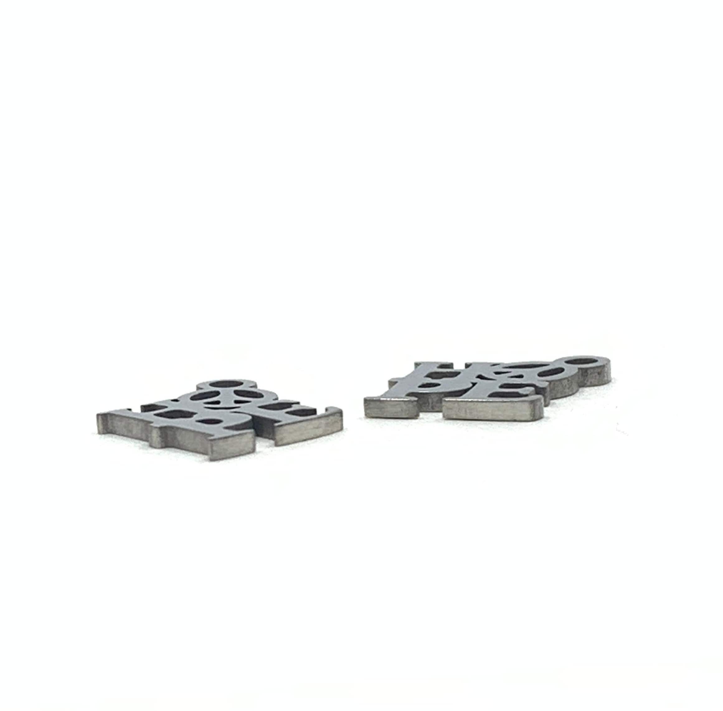 Thickness of hope charms shown against a white background 