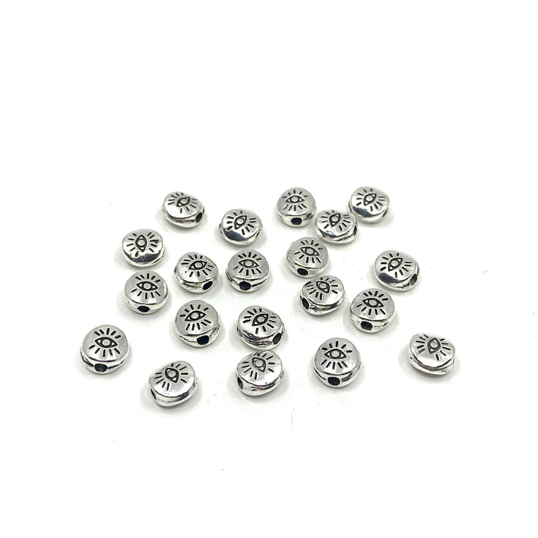 20pcs Flat round Tibetan Style Evil eye beads shown against a white background