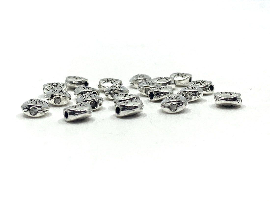 20pcs Flat round Tibetan Style Evil eye beads shown against a white background
