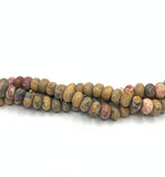 Mixed jasper gemstone bead strands twisted onto each other